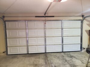 Almond short panel garage door enterior, one piece replacement in Henderson NV (1)
